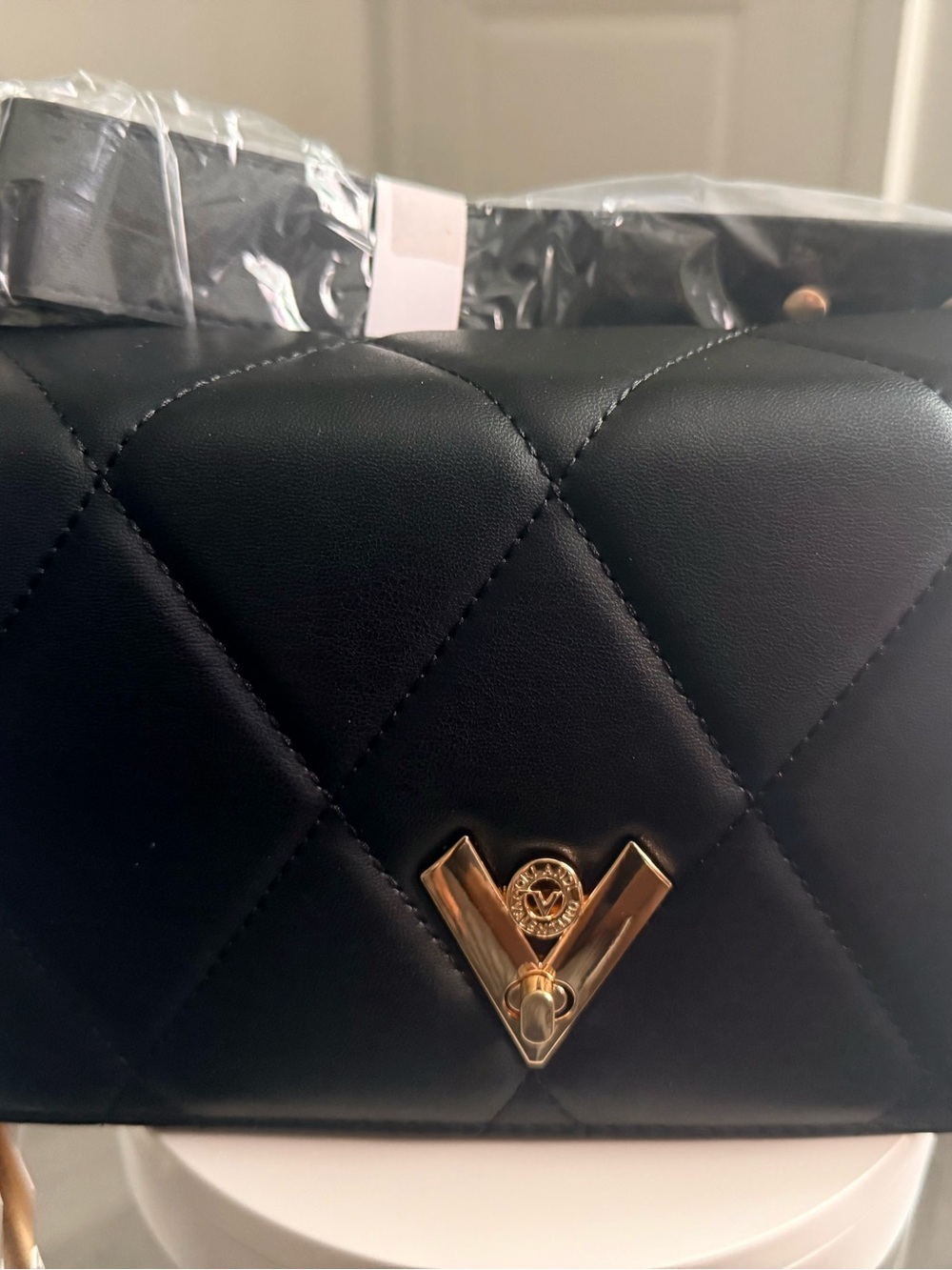 Valentino Black Quilted Crossbody with Gold V Emblem